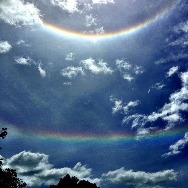 Double upside-down rainbows on a sunny day...but, what does it mean? ;)